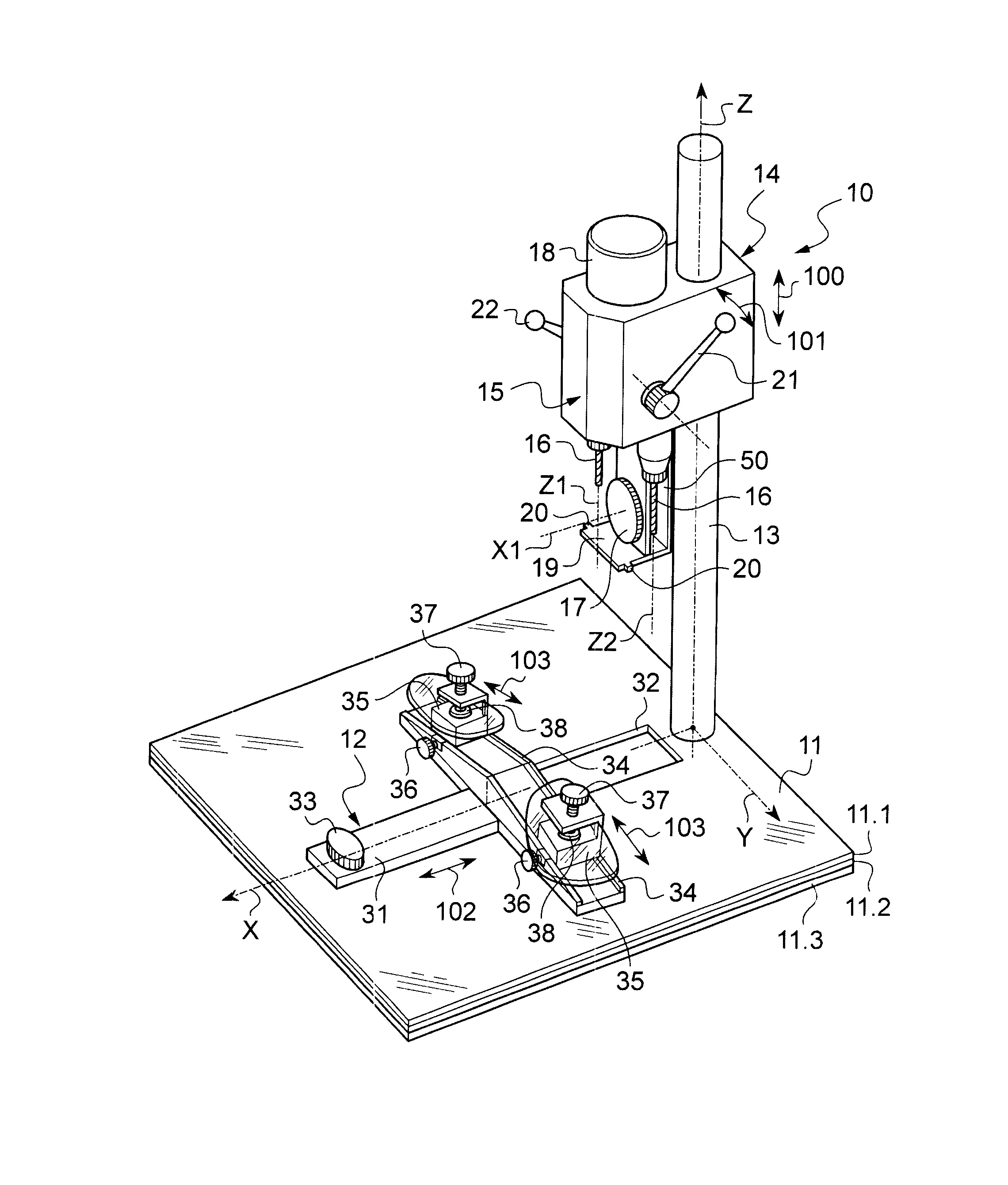 Dispositif de percage de verres optiques